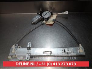 Suzuki Liana Fenstermechanik 4-türig links hinten O290843 foto 2