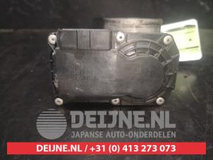 Subaru Forester Drosselklappengehäuse O516982 foto 3