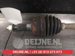 Daihatsu Sirion Aandrijfas rechts-voor O517705 foto 2