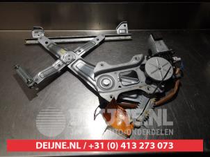 Subaru Impreza Fenstermechanik 4-türig links hinten O290488 foto 2