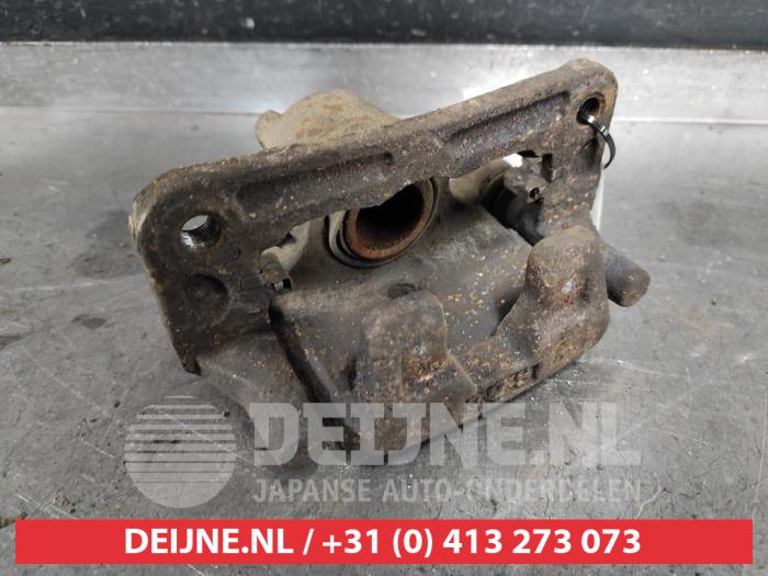 Mitsubishi Pajero Remklauw (Tang) links-achter O518395