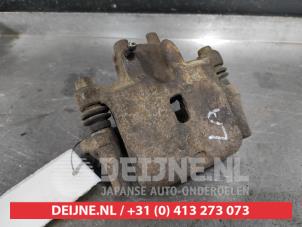 Mitsubishi Pajero Rear brake calliper, left O518395 photo 2