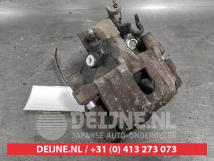 Toyota Yaris Rear brake calliper, left O518650 photo 2