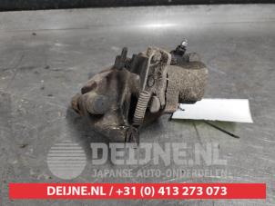 Toyota Yaris Rear brake calliper, left O518650 photo 3