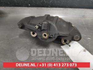 Toyota Yaris Front brake calliper, left O519398 photo 3