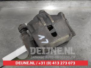 Toyota Yaris Front brake calliper, left O519398 photo 2