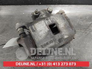 Mitsubishi L200 Bremszange links vorne O520091 foto 2