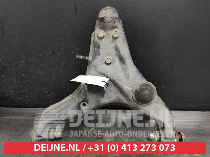 Mitsubishi L200 Draagarm onder rechts-voor O520094