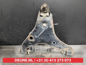 Mitsubishi L200 Front lower wishbone, right O520094 photo 2