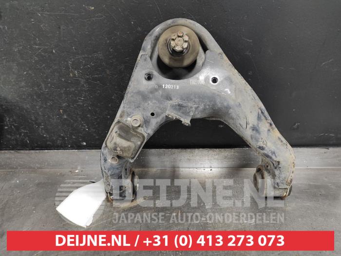 Mitsubishi L200 Draagarm boven rechts-voor O520096