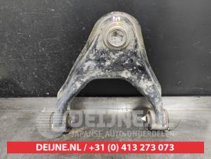 Mitsubishi L200 Front upper wishbone, right O520096 photo 2