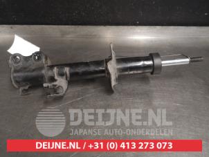 Nissan Micra Schokdemper rechts-voor O521579 foto 3