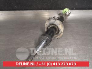 Nissan Micra Schokdemper rechts-voor O521579 foto 2