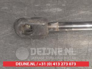 Nissan Micra Gasdemper links-achter O522490 foto 2
