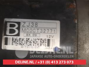 Startmotor van een Mazda 2 (DE) 1.3 16V S-VT 2008