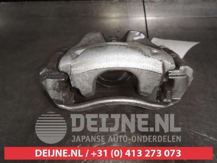 Toyota Corolla Bremszange links vorne O523201