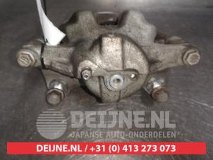 Toyota Corolla Bremszange links vorne O523201 foto 2