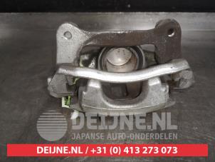 Toyota Corolla Bremszange links vorne O523201 foto 3