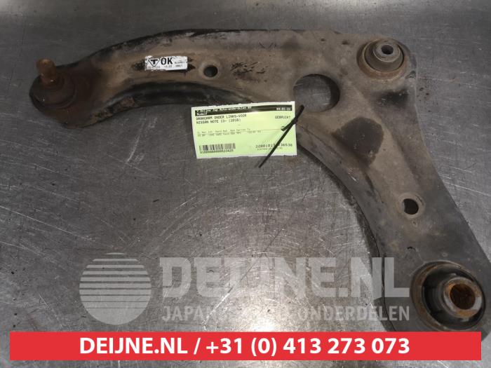 Nissan Note Draagarm onder links-voor O523425