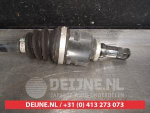 Toyota Yaris Front drive shaft, left O523470 photo 3