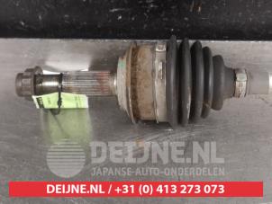 Toyota Yaris Front drive shaft, left O523470 photo 2