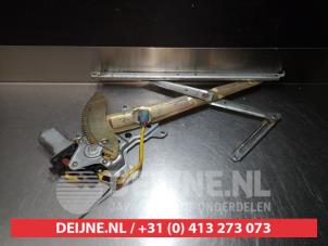 Daihatsu Sirion Fenstermechanik 4-türig links hinten O290780 foto 2