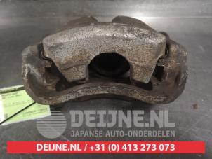 Toyota Camry Bremszange rechts vorne O523887 foto 3