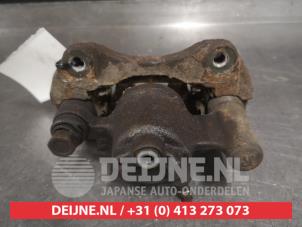 Toyota Camry Bremszange rechts hinten O523888 foto 2