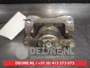 Suzuki Ignis Front brake calliper, left O524222 photo 2