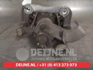 Kia Stonic Remklauw (Tang) links-achter O524996 foto 2