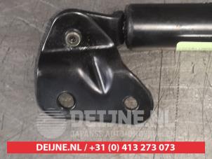 Daihatsu Cuore Rear gas strut, left O525146 photo 2