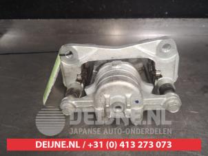 Suzuki Swift Remklauw (Tang) links-voor O525572 foto 2
