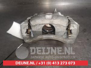 Suzuki Swift Remklauw (Tang) links-voor O525572 foto 3