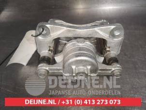 Suzuki Swift Front brake calliper, right O525573 photo 2