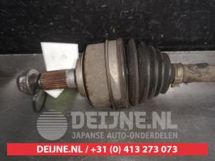 Honda Jazz Aandrijfas links-voor O525847 foto 2