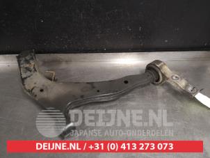Nissan Murano Querlenker unten links vorne O526178 foto 2