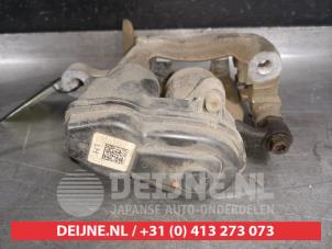 Nissan Qashqai Bremszange links hinten O526267 photo 2