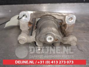 Nissan Juke Bremszange links hinten O527148 foto 2