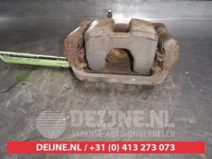 Nissan Leaf Remklauw (Tang) links-achter O527400 foto 3