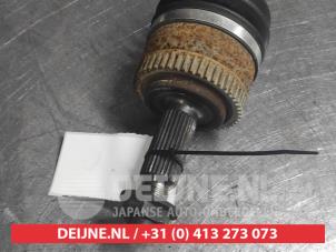 Kia Carens Aandrijfas links-voor O528343 foto 2