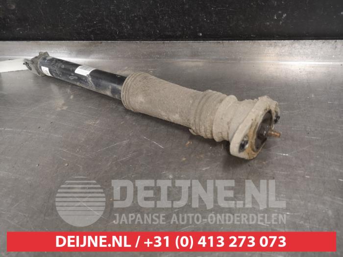 Kia Sportage Schokdemper links-achter O530278
