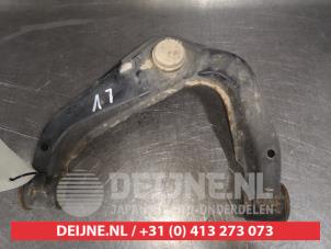 Nissan Pathfinder Draagarm Boven links-voor O530373 foto 2