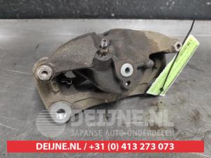 Mazda 3 Bremszange links vorne O530607 foto 3