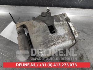 Mazda 3 Bremszange links vorne O530607 foto 2
