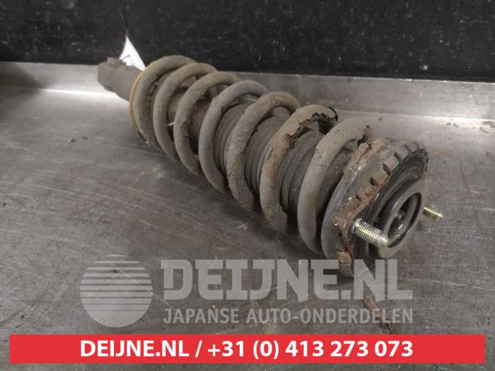 Subaru Legacy Stoßdämpferstrebe links hinten O530750
