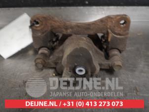 Subaru Legacy Rear brake calliper, left O530758 photo 2