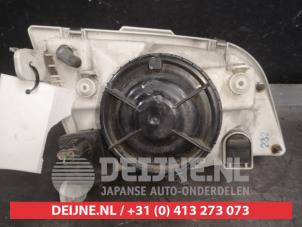 Mitsubishi Space Star Koplamp links O531367 foto 2