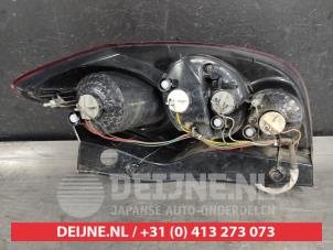 Ssang Yong Korando Rücklicht links O532668 foto 2