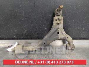 Ssang Yong Korando Querlenker unten links vorne O533155 foto 2