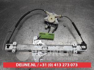 Kia Rio Fenstermechanik 2-türig rechts vorne O533756 foto 2
